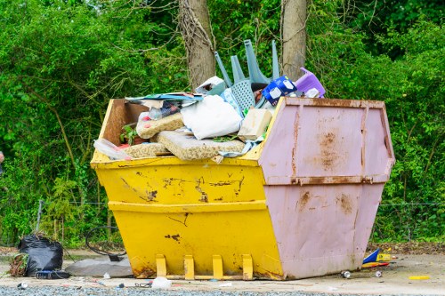 House clearance professionals sorting items in Westham home